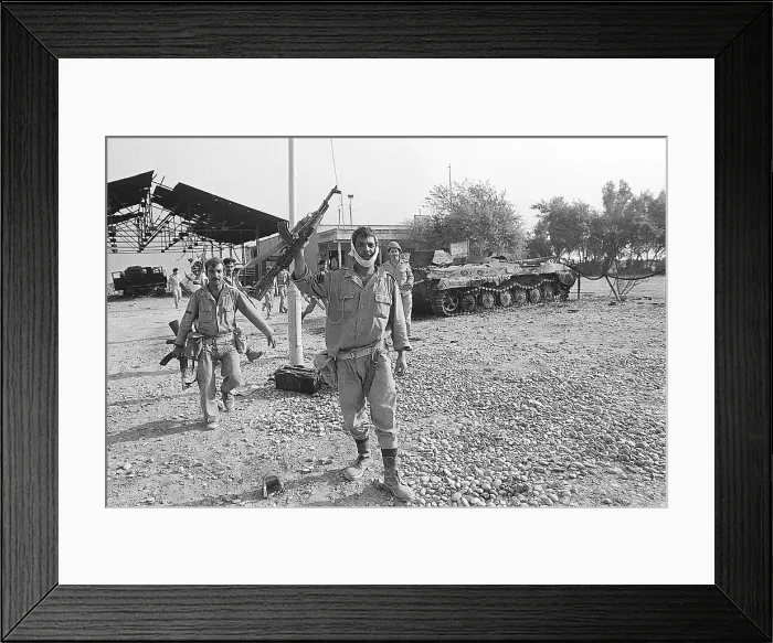 Framed Print : Iraqi Soldier Raises AK47 Rifle