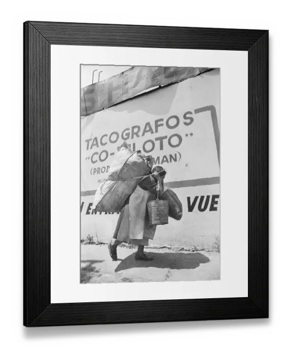 Framed Print : Woman Hauls Trash On Back & In Arms Framed Print : Woman Hauls Trash On Back & In Arms