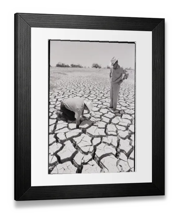 Framed Print : Man Sticks His Arm In Crack In Dry Groun Framed Print : Man Sticks His Arm In Crack In Dry Groun