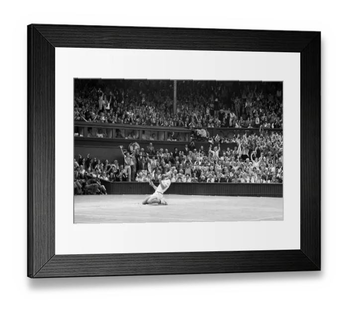 Framed Print : Bjorn Borg Kneeling in Stadium After Win Framed Print : Bjorn Borg Kneeling in Stadium After Win