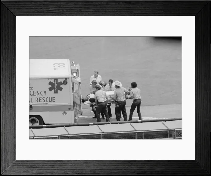 Framed Print : Baseball Pitcher Being Carried on Stretcher Framed Print : Baseball Pitcher Being Carried on Stretcher