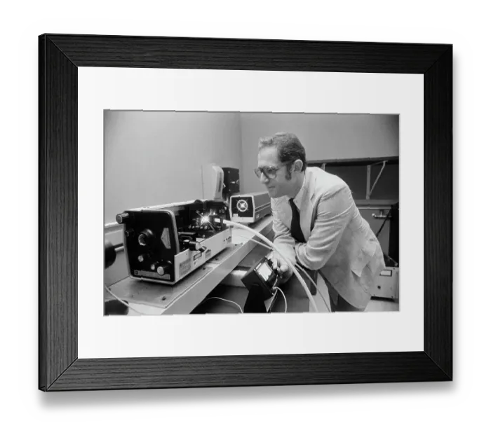 Framed Print : Doctor Sitting at Radiation Therapy Machinery Framed Print : Doctor Sitting at Radiation Therapy Machinery