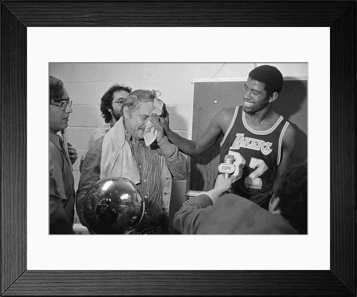 Framed Print : Magic Johnson Wiping Jerry Buss's Forehead Framed Print : Magic Johnson Wiping Jerry Buss's Forehead