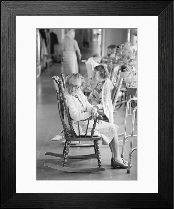 Framed Print : Elderly Woman Sitting In Rocking Chair Framed Print : Elderly Woman Sitting In Rocking Chair