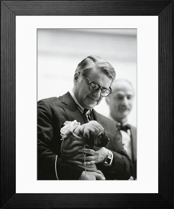 Framed Print : Edwin H. Land Petting Puppy Framed Print : Edwin H. Land Petting Puppy