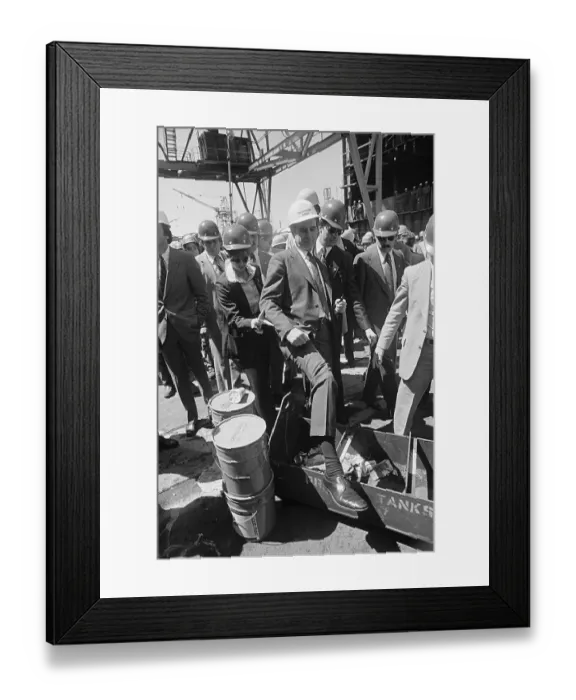 Framed Print : George Bush Stepping over a Container