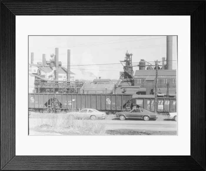 Framed Print : Industrial Site with Passing Train and Automobiles Framed Print : Industrial Site with Passing Train and Automobiles