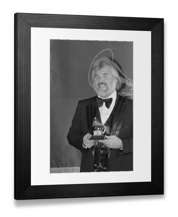Framed Print : Kenny Rogers Holding His Grammy Framed Print : Kenny Rogers Holding His Grammy