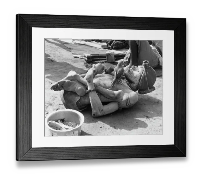 Framed Print : Deformed Begger in India with Parrot Framed Print : Deformed Begger in India with Parrot