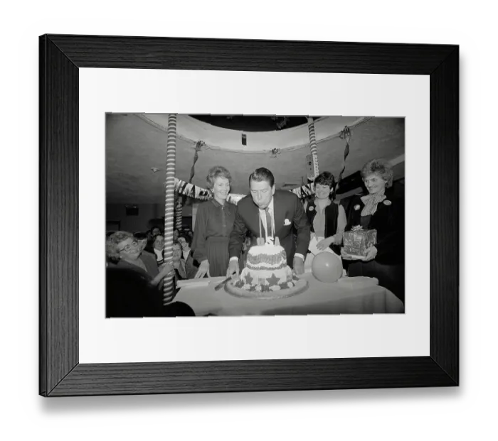Framed Print : Ronald Reagan Blowing out Birthday Candles Framed Print : Ronald Reagan Blowing out Birthday Candles