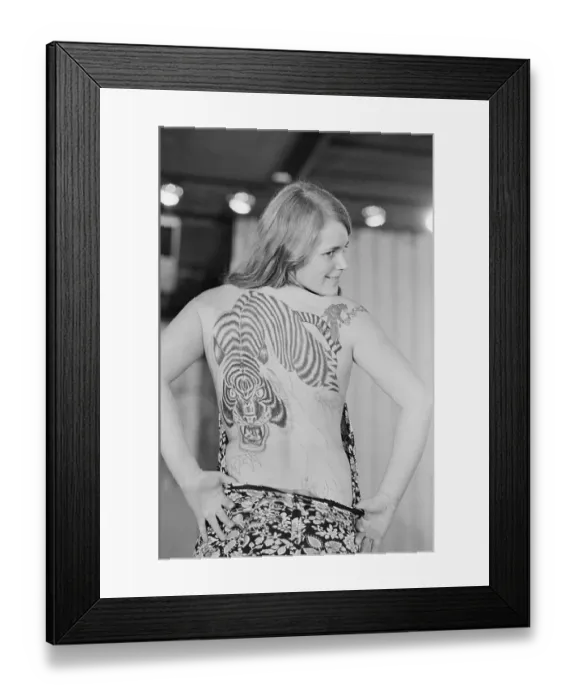 Framed Print : Kathy Sundahl Displays Tattoo On Back Framed Print : Kathy Sundahl Displays Tattoo On Back