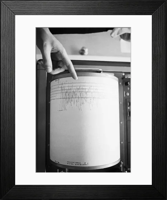 Framed Print : Finger Pointing To Seismograph Reading Framed Print : Finger Pointing To Seismograph Reading
