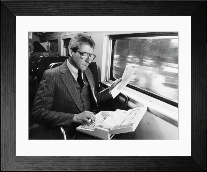 Framed Print : Businessman Using Early Laptop Framed Print : Businessman Using Early Laptop