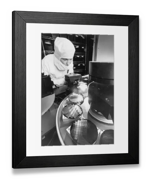 Framed Print : IBM Employee Checking Robotic Arm Framed Print : IBM Employee Checking Robotic Arm