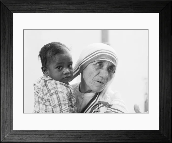Framed Print : Mother Teresa Holding Young Boy