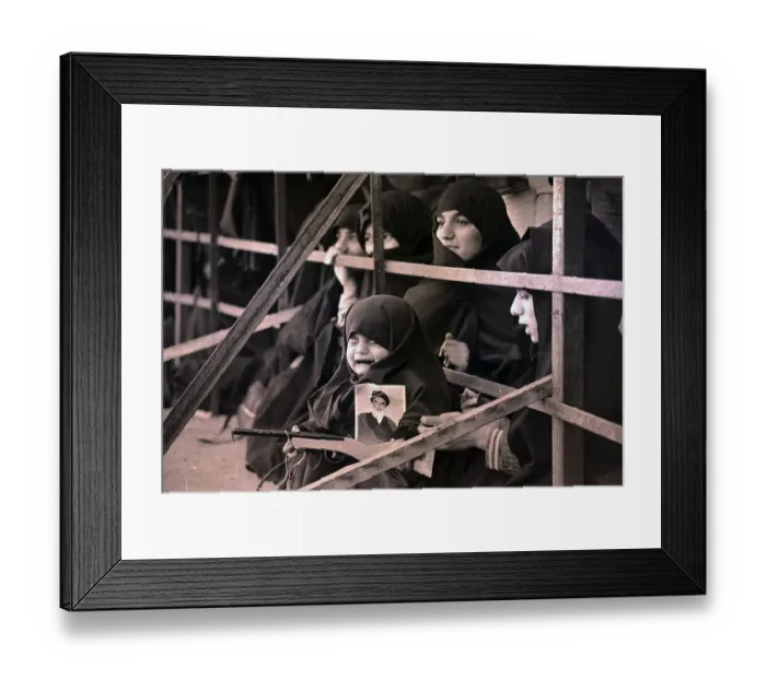 Framed Print : Iranian Girl in Tears with Pop Gun