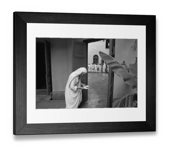 Framed Print : Mother Teresa Praying in Hall Framed Print : Mother Teresa Praying in Hall