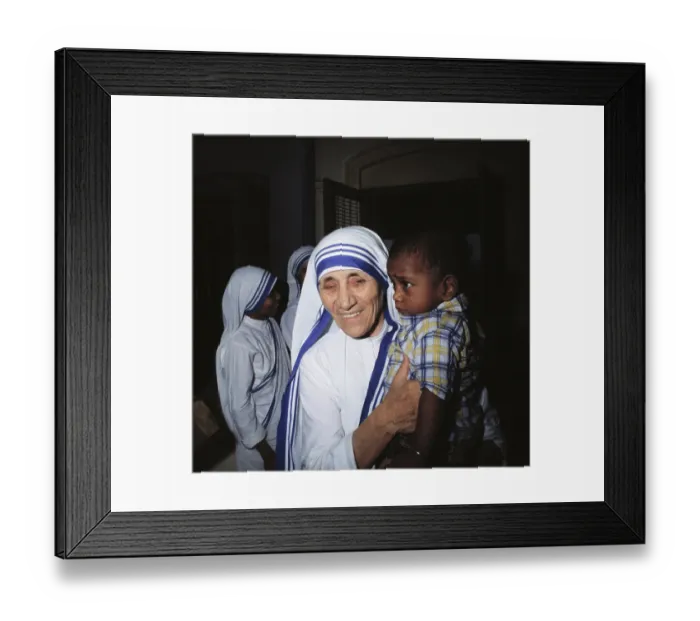Framed Print : Mother Teresa Holding Young Boy Framed Print : Mother Teresa Holding Young Boy