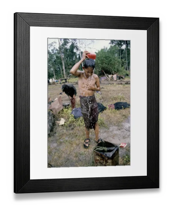 Framed Print : Boy Washing At Refugee Camp Framed Print : Boy Washing At Refugee Camp