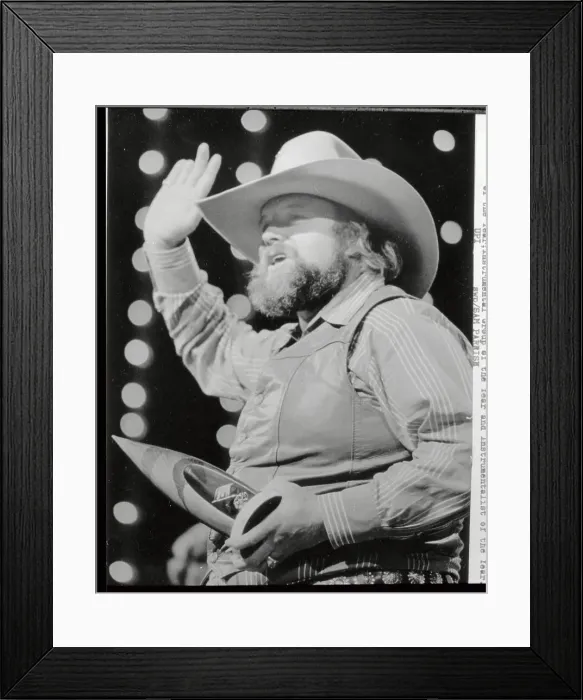 Framed Print : Charlie Daniels Holding Award and Waving Framed Print : Charlie Daniels Holding Award and Waving
