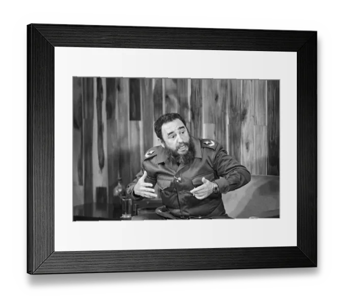 Framed Print : Fidel Castro Seated At News Conference Framed Print : Fidel Castro Seated At News Conference