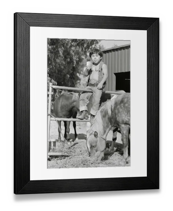 Framed Print : Actor Herve Villechaize Straddling Fence with Horses Nearby Framed Print : Actor Herve Villechaize Straddling Fence with Horses Nearby