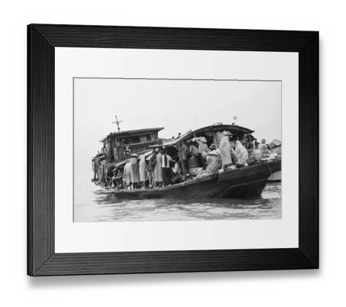 Framed Print : Refugees Huddled On Boat In Rain Downpou Framed Print : Refugees Huddled On Boat In Rain Downpou