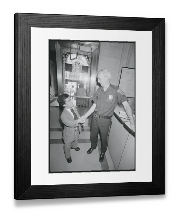Framed Print : Burton Gutterman Shaking Hands with Police Officer Framed Print : Burton Gutterman Shaking Hands with Police Officer