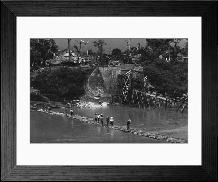 Framed Print : People Walk On River On Small Temp Bridg
