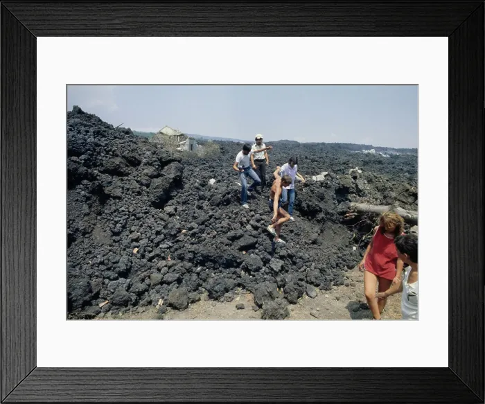 Framed Print : Tourists Walking Over Lava Rock Framed Print : Tourists Walking Over Lava Rock