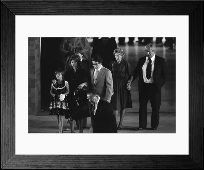 Framed Print : Diane Munson and Daughter Tracy at Funeral Framed Print : Diane Munson and Daughter Tracy at Funeral