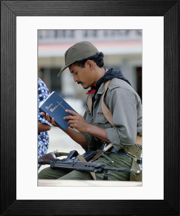 Framed Print : Sandinista Guerrilla Reading Bible Framed Print : Sandinista Guerrilla Reading Bible