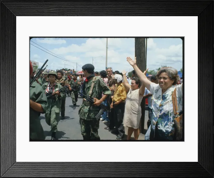 Framed Print : Daniel Ortega Marching with Demonstrators