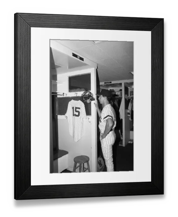 Framed Print : Fred Stanley Pauses in Front of Munson's Locker