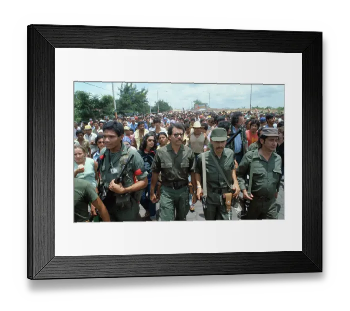 Framed Print : Daniel Ortega Marching with Demonstrators