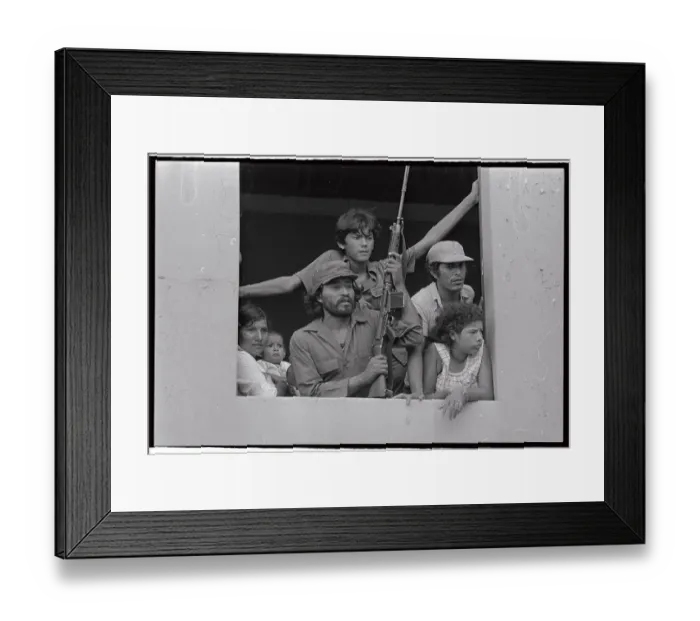 Framed Print : Sandinista Soldier with Family Holding Gun Framed Print : Sandinista Soldier with Family Holding Gun