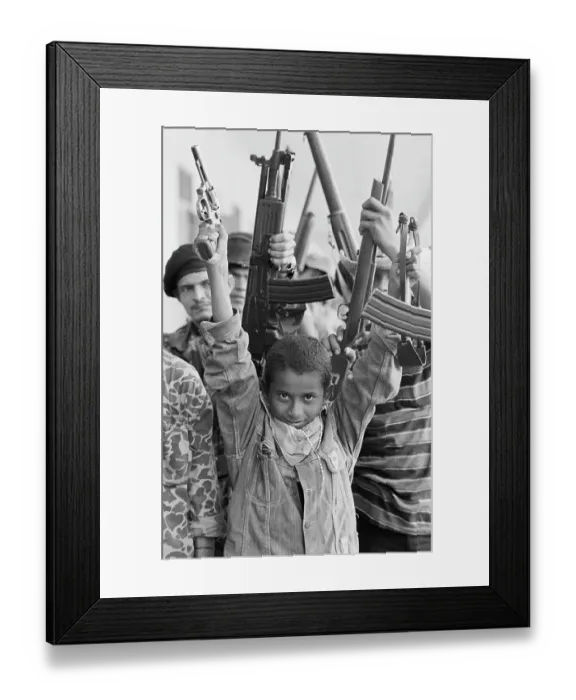 Framed Print : Young Sandinista With Gun And Slingshot