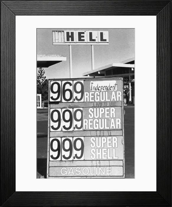 Framed Print : Sign Vandalized at Gas Station Framed Print : Sign Vandalized at Gas Station