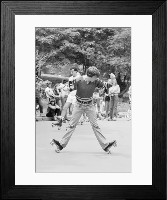 Framed Print : Roller Skater with Portable Radio Framed Print : Roller Skater with Portable Radio