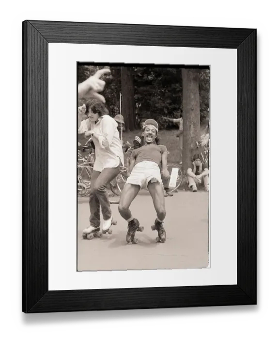 Framed Print : Man Limbos While Roller Skating