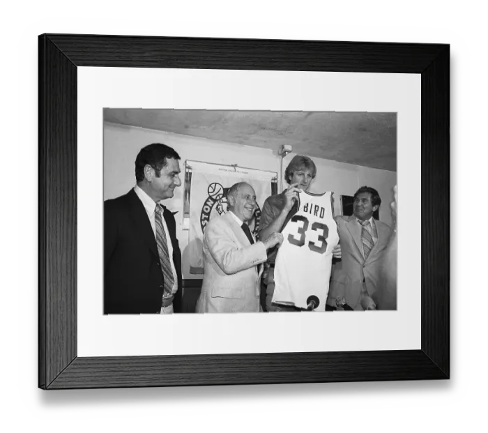 Framed Print : Larry Bird Displaying Team Jersey at a News Conference Framed Print : Larry Bird Displaying Team Jersey at a News Conference
