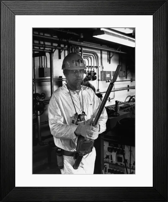 Framed Print : Technician Measures Radiation In Plant