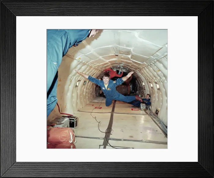 Framed Print : Astronaut Defying Gravity Framed Print : Astronaut Defying Gravity