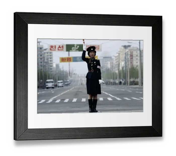 Framed Print : Female Police Officer in Middle of Street Framed Print : Female Police Officer in Middle of Street