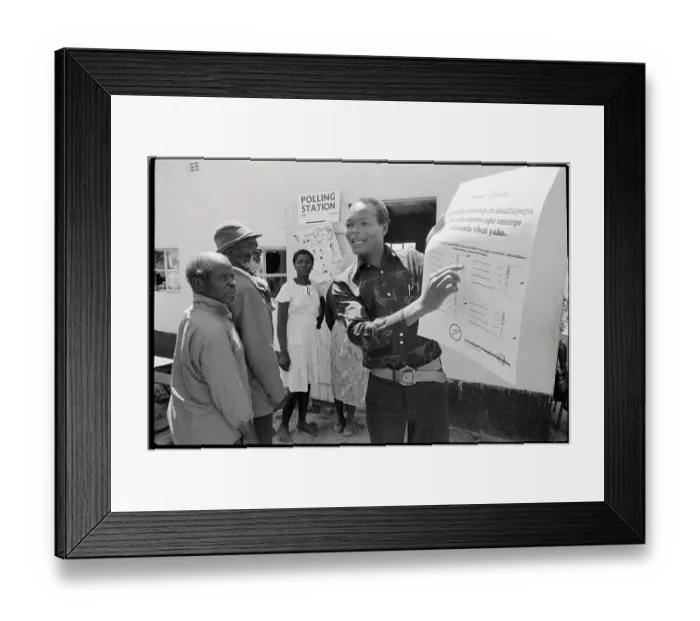 Framed Print : Election Official Pointing at Ballot Sign Framed Print : Election Official Pointing at Ballot Sign