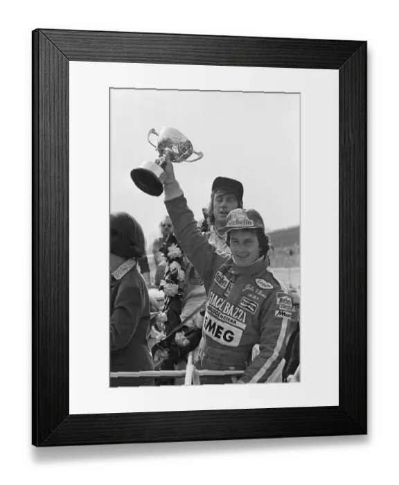 Framed Print : Gilles Villeneuve Holds Trophy Aloft Framed Print : Gilles Villeneuve Holds Trophy Aloft