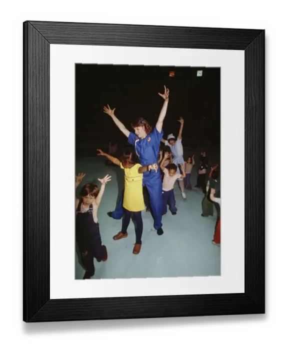 Framed Print : Red Cross Volunteer Entertaining Children Framed Print : Red Cross Volunteer Entertaining Children