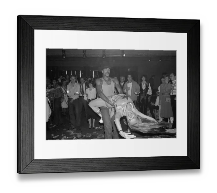 Framed Print : Julie Newmar Swinging from Partner's Waist Framed Print : Julie Newmar Swinging from Partner's Waist