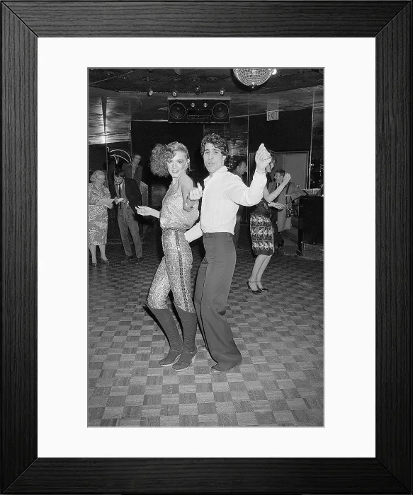 Framed Print : Travolta Look Alike Contest Entrant Dancing in Disco Framed Print : Travolta Look Alike Contest Entrant Dancing in Disco
