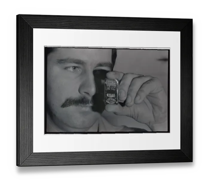 Framed Print : Man Holding Bache Halsey Gold Bar by Face Framed Print : Man Holding Bache Halsey Gold Bar by Face